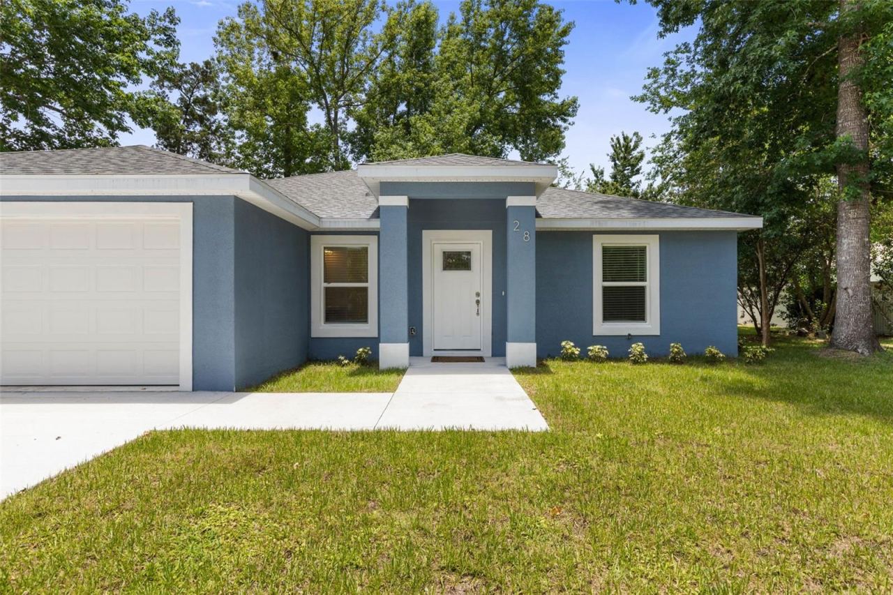 Photo 2 of 28 Woodston Ln, Palm Coast, FL 32164