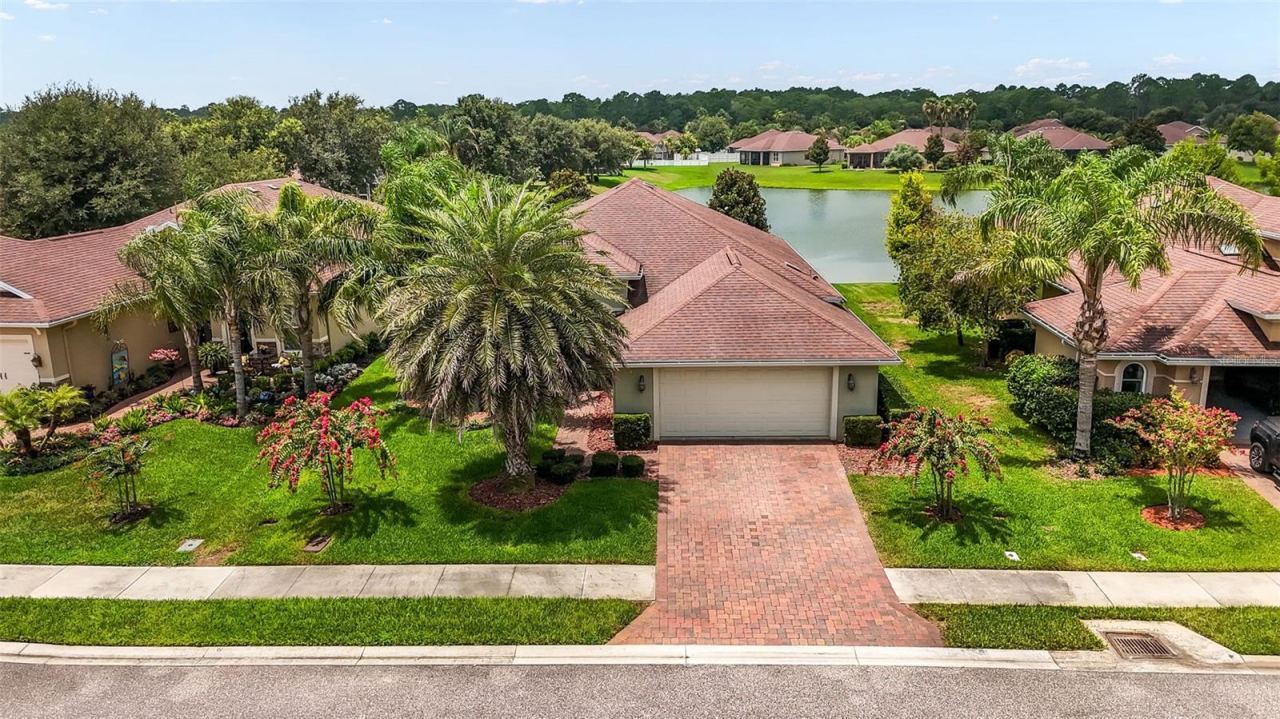 Photo 2 of 64 Arena Lake Dr, Palm Coast, FL 32137