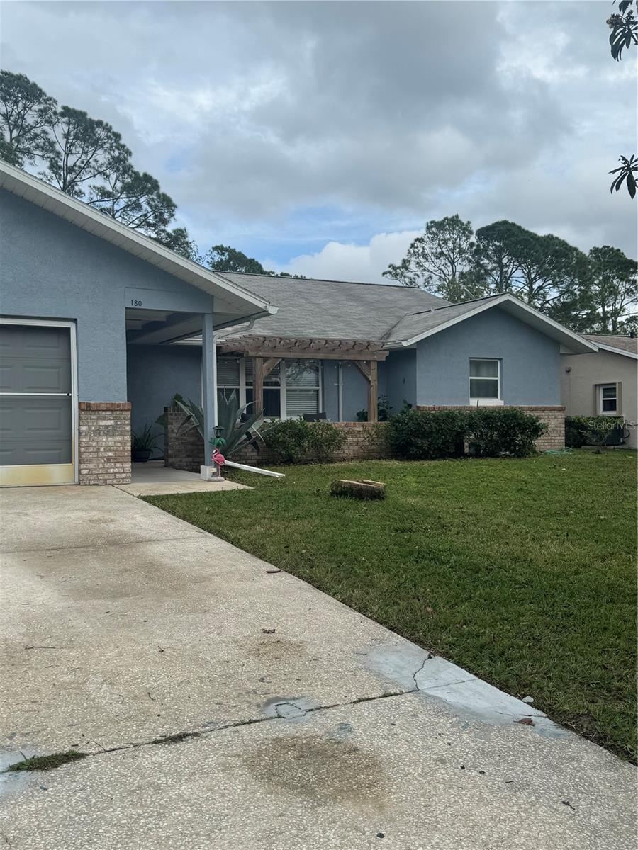 Photo 2 of 180 Beechwood Ln, Palm Coast, FL 32137