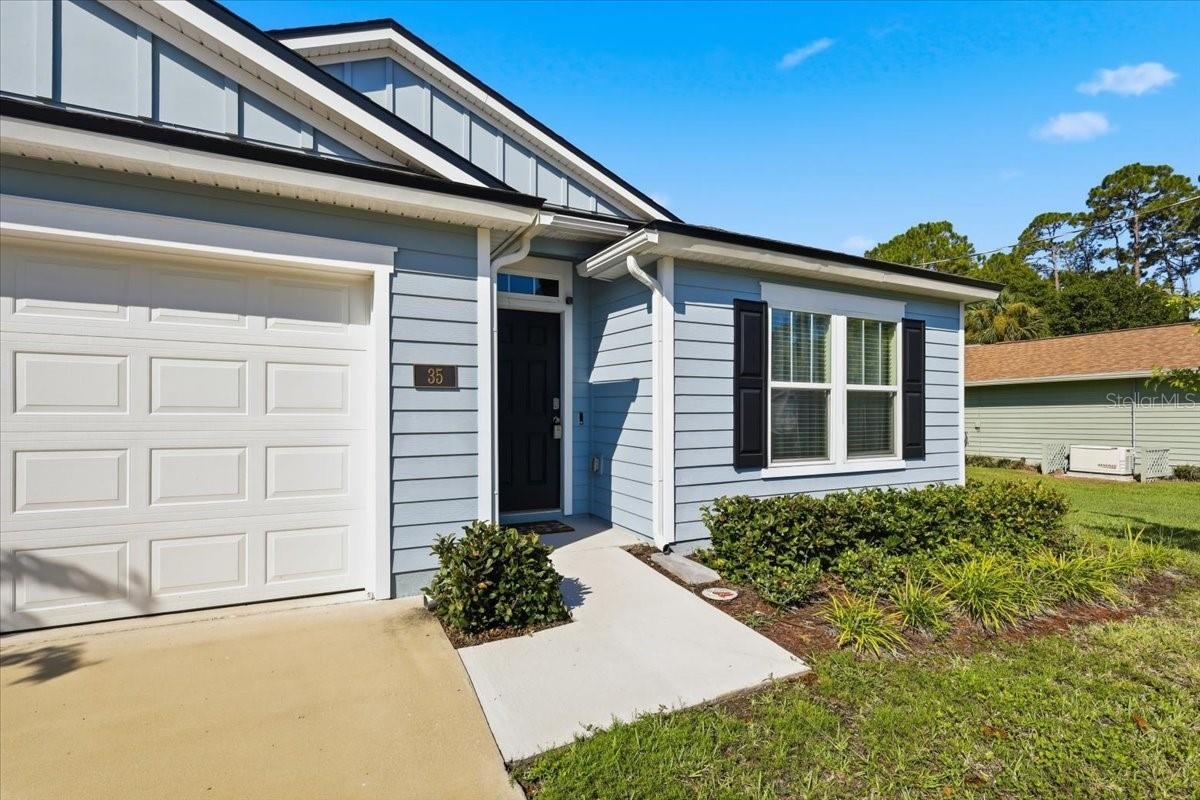 Photo 3 of 35 Putter Dr, Palm Coast, FL 32164