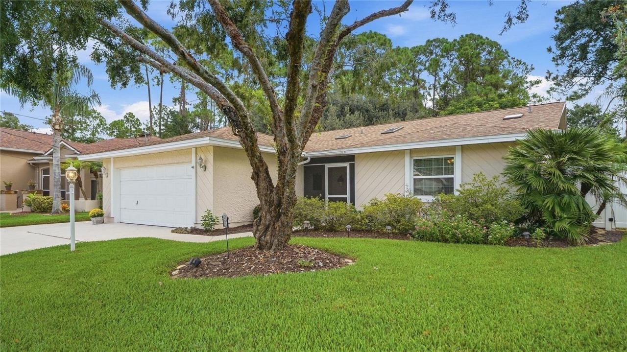 Photo 2 of 12 Woodford Ln, Palm Coast, FL 32164