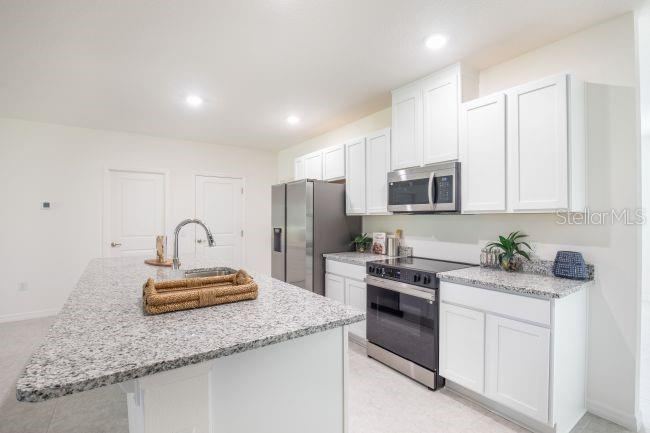 Photo 5 of 24 Ramrock Ln, Palm Coast, FL 32137