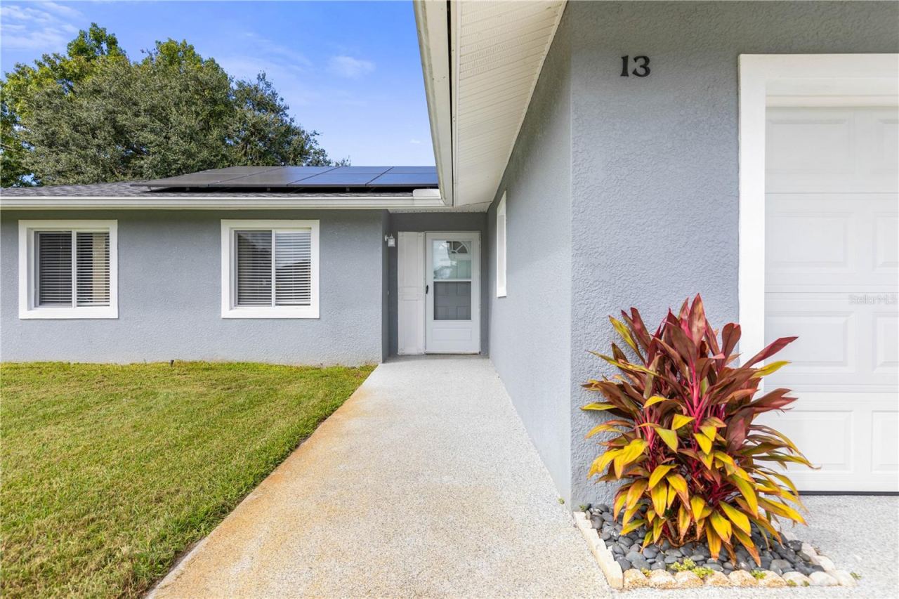 Photo 2 of 13 Belleaire Dr, Palm Coast, FL 32137