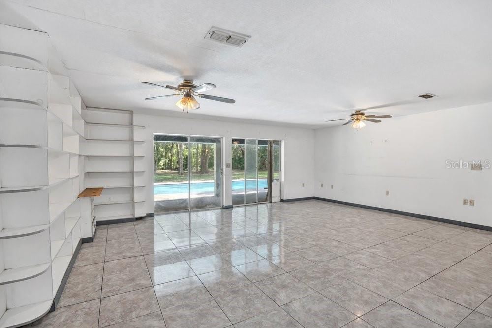 Photo 4 of 211 S Gaines St, Oak Hill, FL 32759