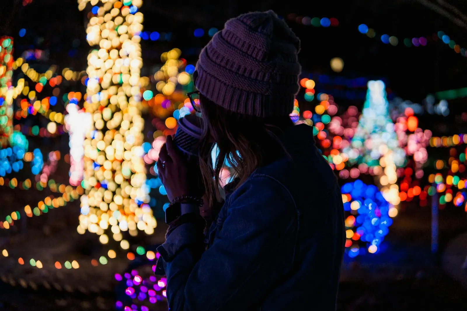 woman looking at christmas lights