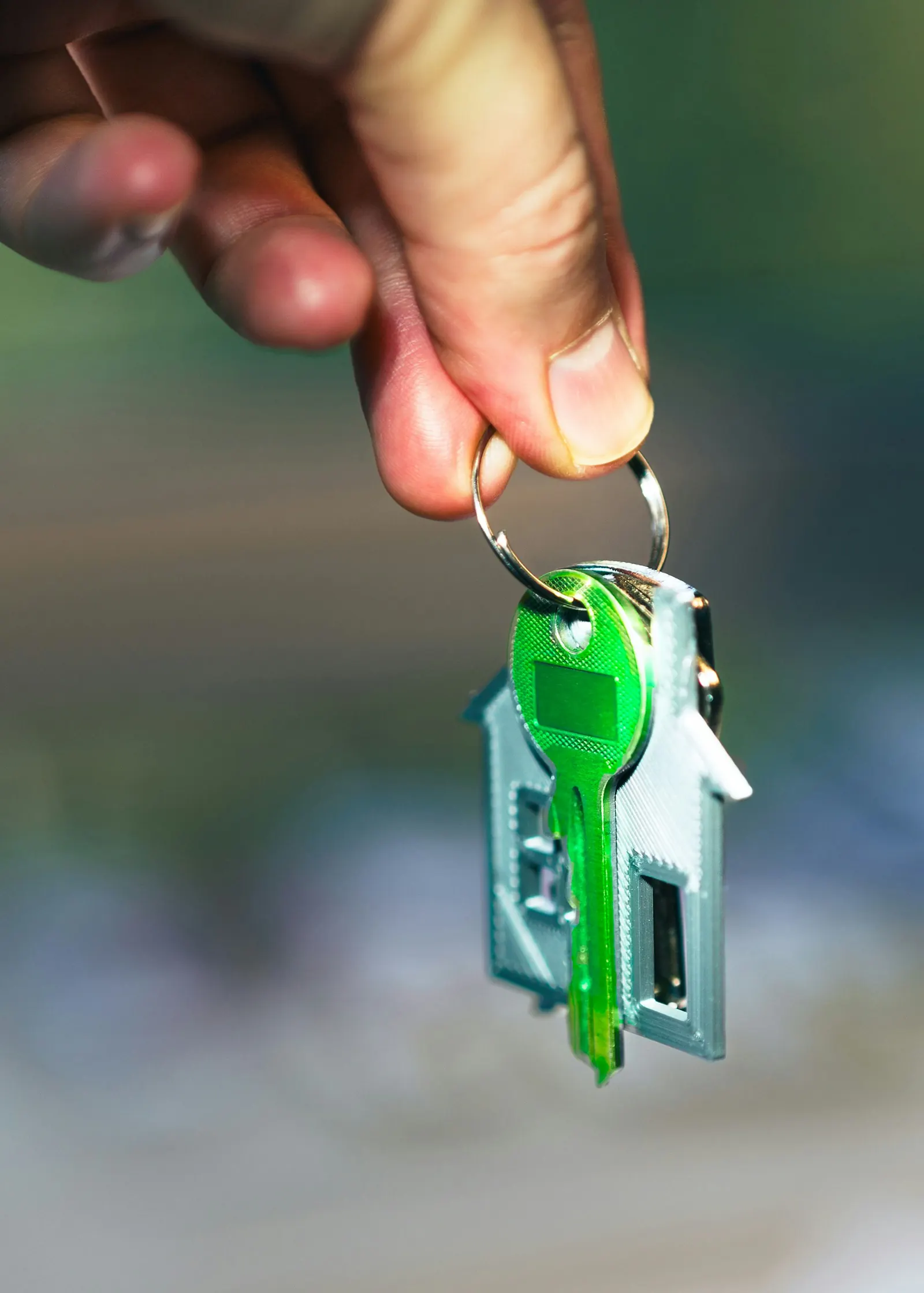 man holding house keys