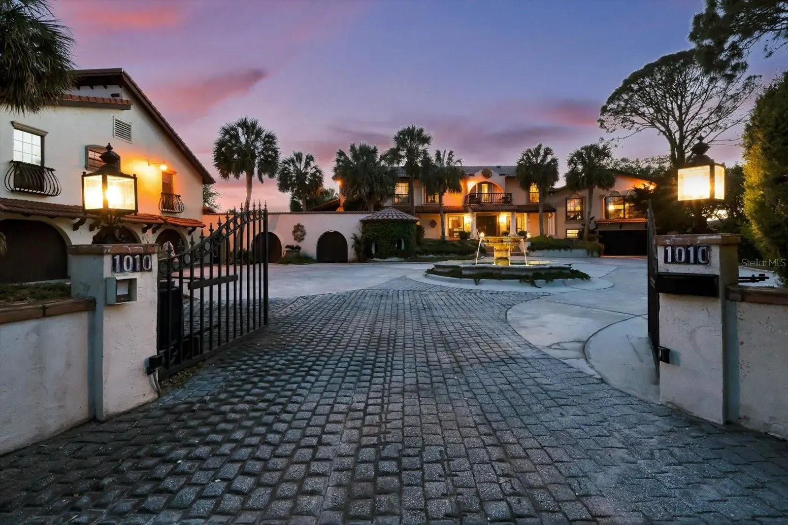 Courtyard entry of a riverfront home in Ormond-by-the-Sea
