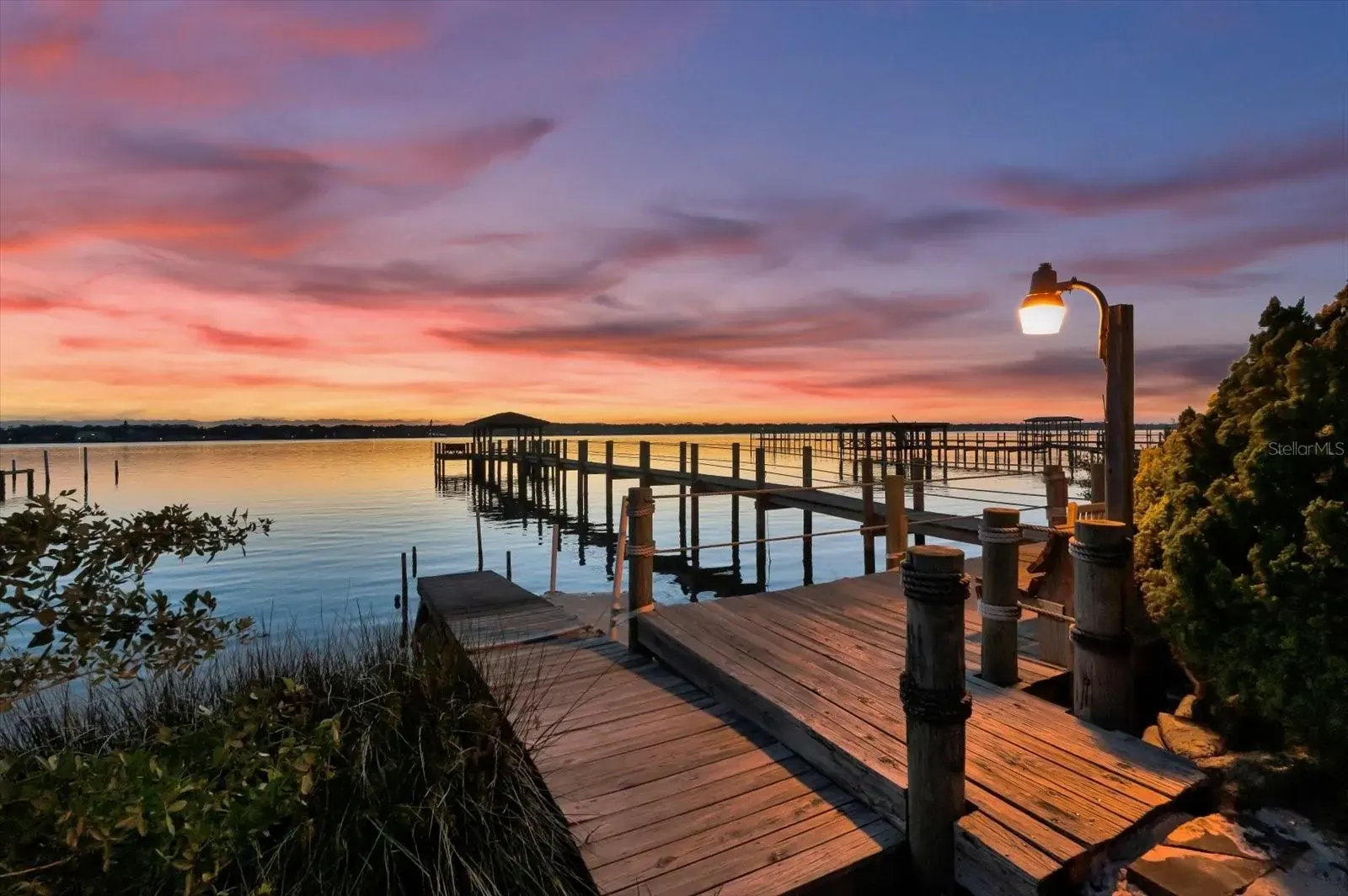 Private dock on the Halifax River at sunset