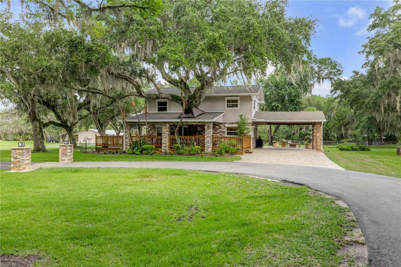 Photo 2 of 800 Hidden Oaks Ln, Oak Hill, FL 32759