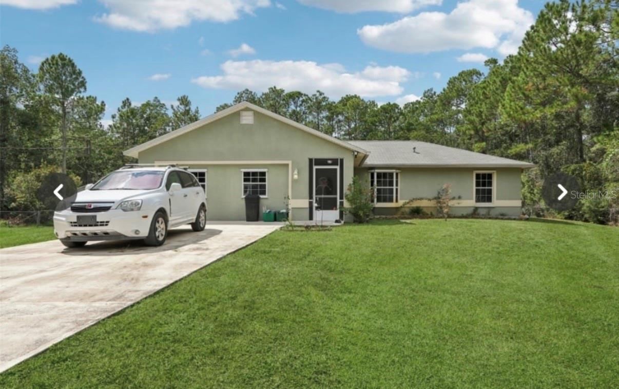 Photo 2 of 1594 Papaya St, Bunnell, FL 32110