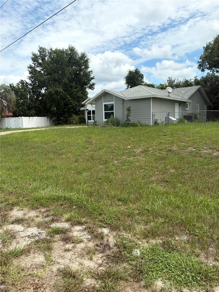 Photo 2 of 1499 Courtland Blvd, Deltona, FL 32738