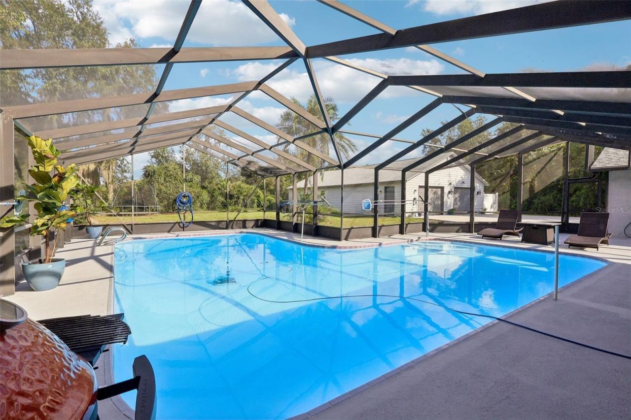 Photo 2 of 5803 Spruce Creek Woods Dr, Port Orange, FL 32127