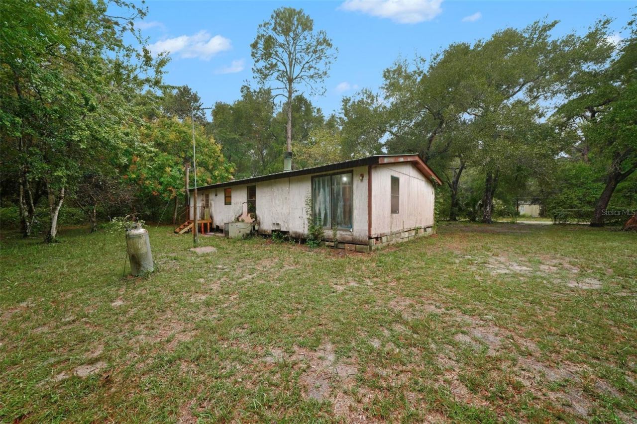 Photo 2 of 114 Shady Oak Dr, Satsuma, FL 32189